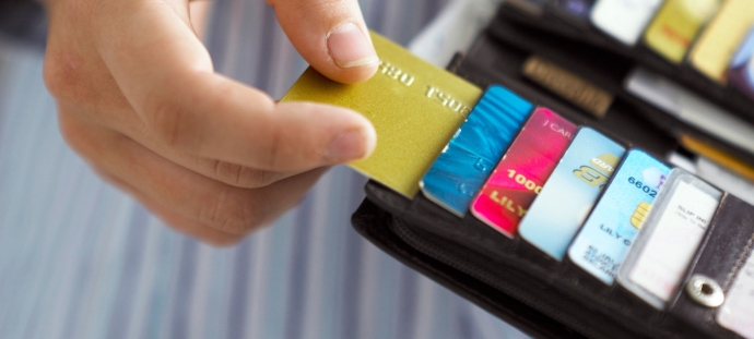 at0crt-close-up-on-woman-taking-credit-card-out-of-her-purse-2